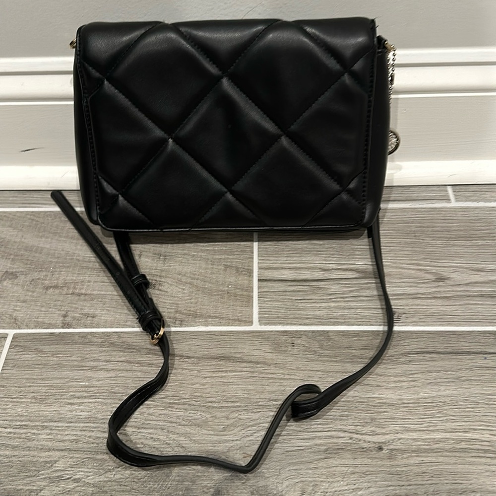 Black purse 11 inches wide 7 1/2 inches tall